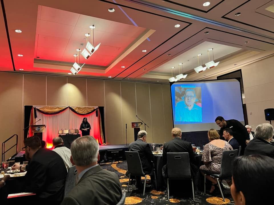 Dinner keynote presentation with family and mentors present